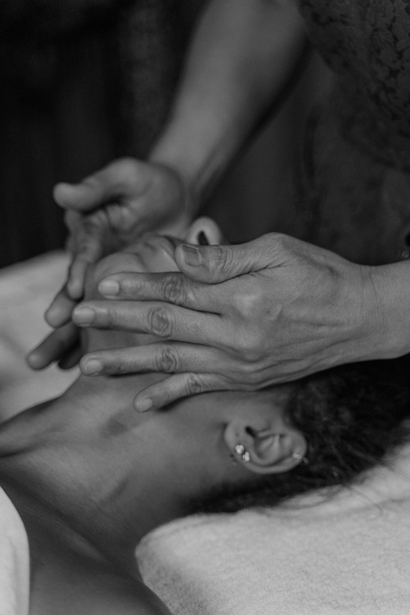 A calming massage captured in black and white, focusing on relaxation and calmness.